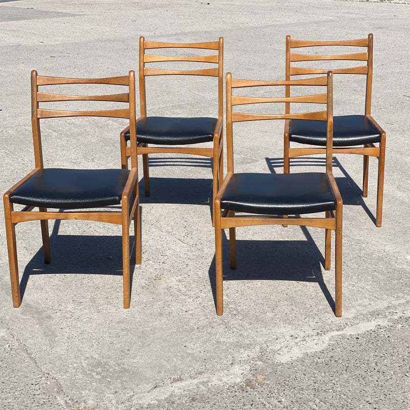 A Set of Mid Century Dining Chairs