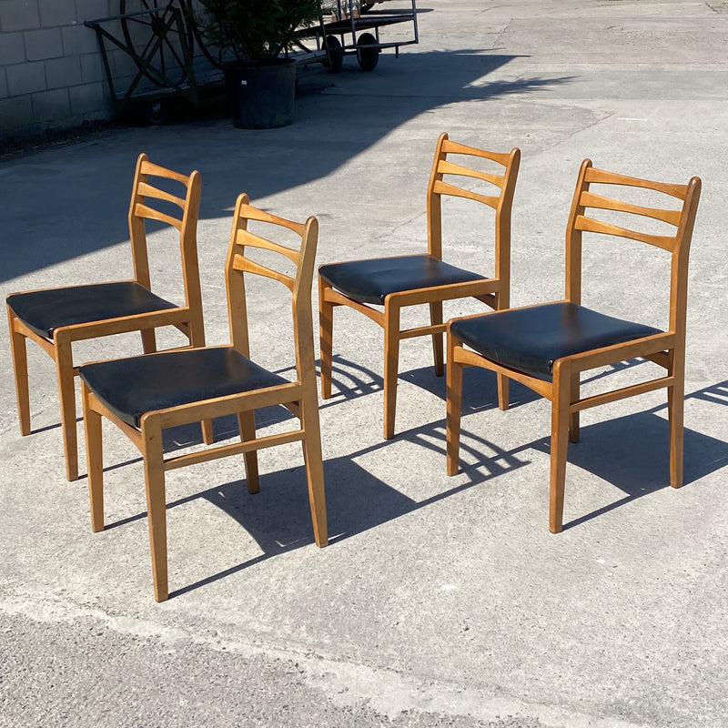 A Set of Mid Century Dining Chairs