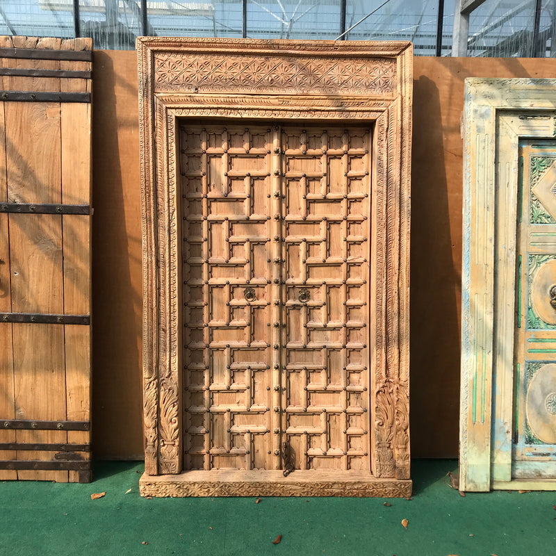 Antique carved teak Indian door with studs (H212cm | W129cm)